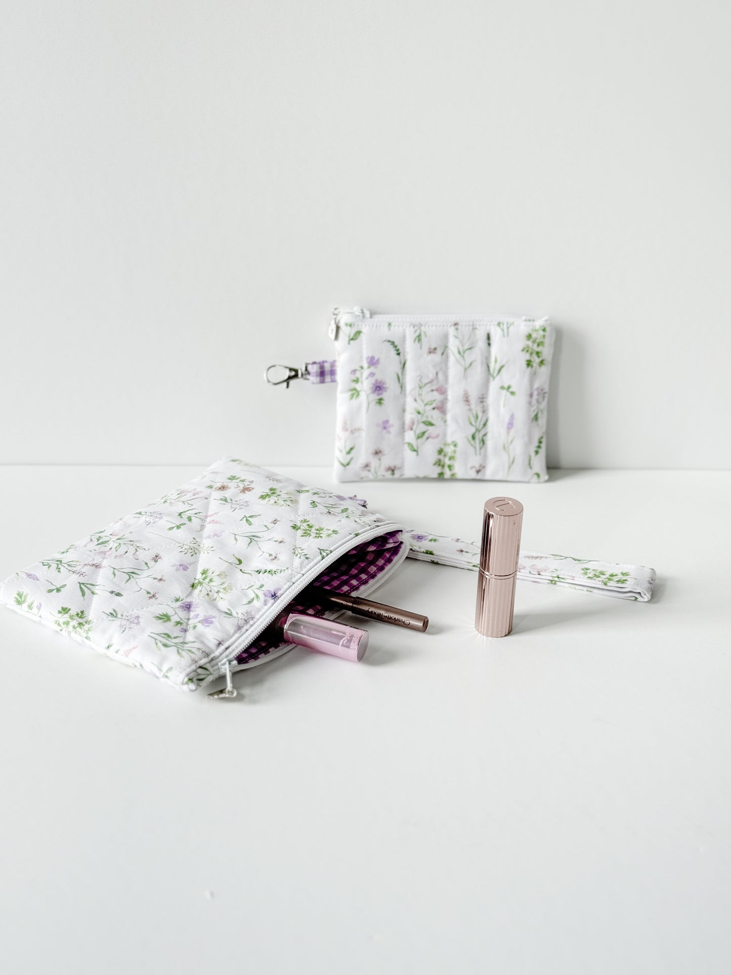 Handmade Lavender Meadow Coin Purse and wristlet featuring a lavender floral quilted cotton pattern