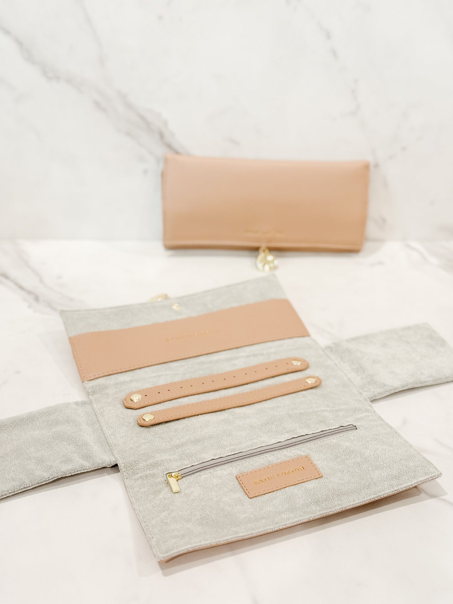 Katie Loxton jewelry travel pouch vegan leather in color soft tan