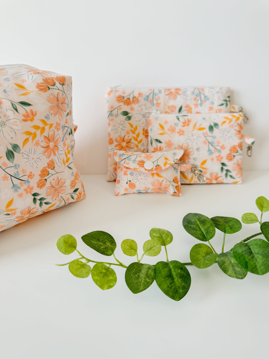 Handmade quilted floral fabric  pouches and bags from the Peach Blossom Meadow Collection