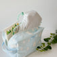 Blue Skies quilted cosmetic bag with zipper and handle