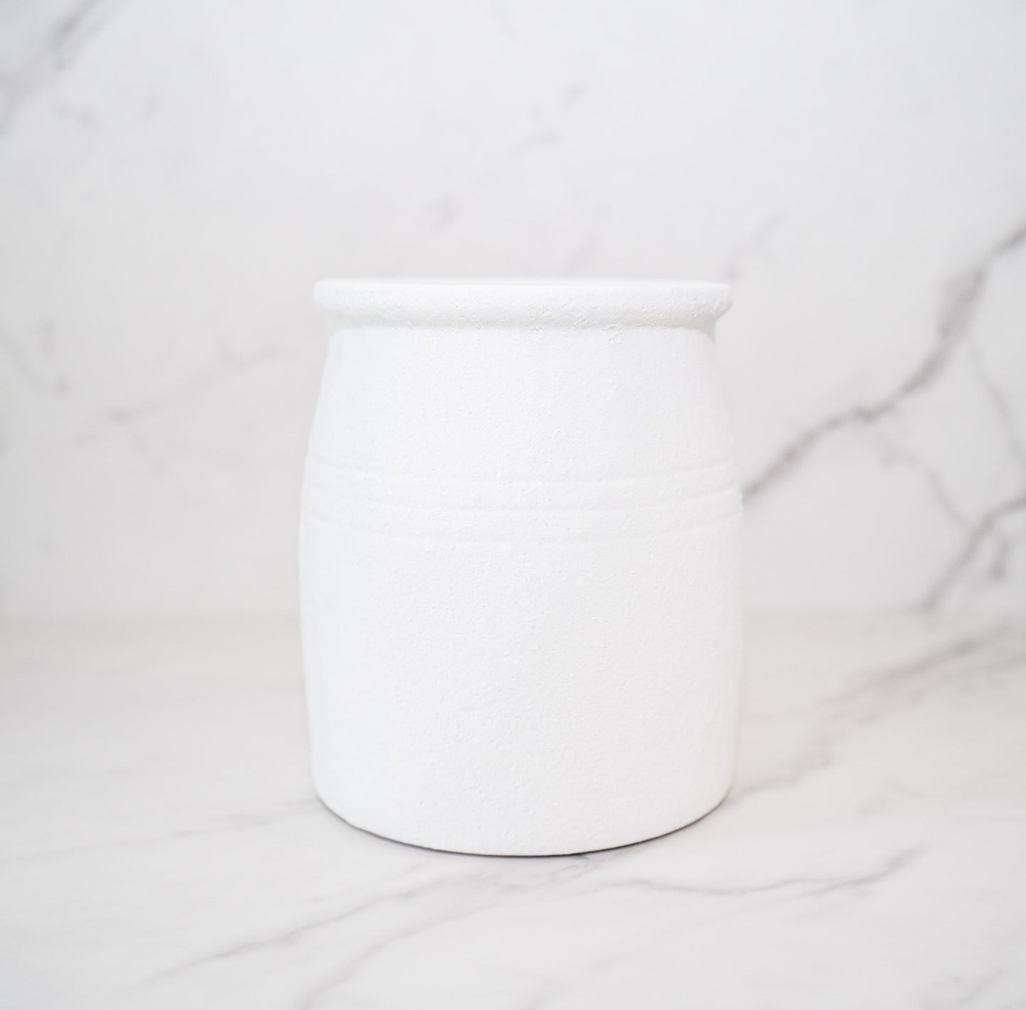 Textured white terracotta pot