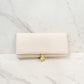 Katie Loxton vegan leather jewelry pouch in the color eggshell