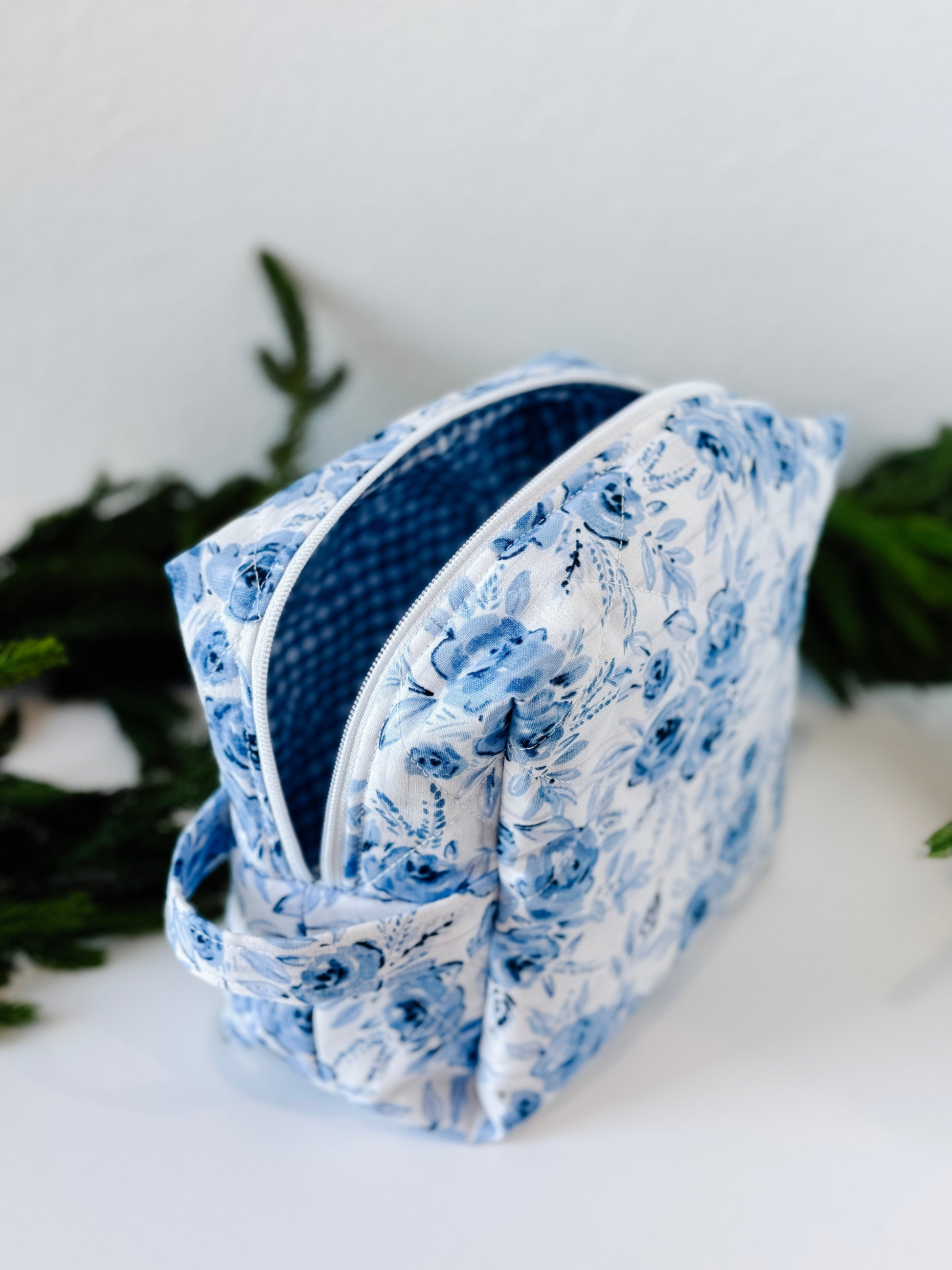 Blue Blossom quilted boxy makeup bag with ginham blue interior