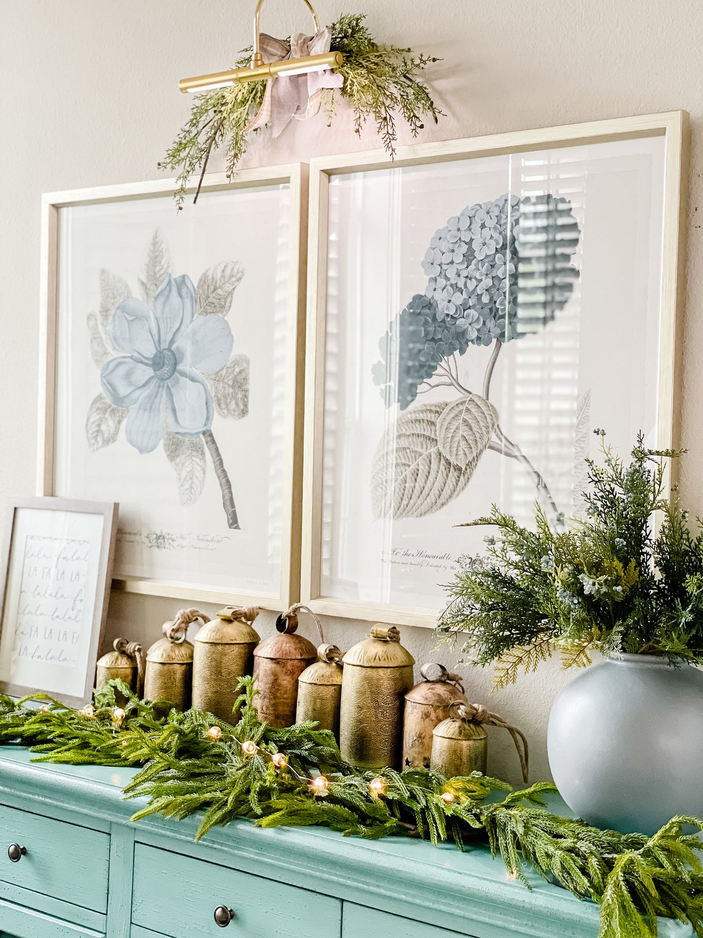 Christmas cow bells with an antique finish, perfect for home decor, holiday decorations, or as a collectible item, styled along the real touch norfolk garland