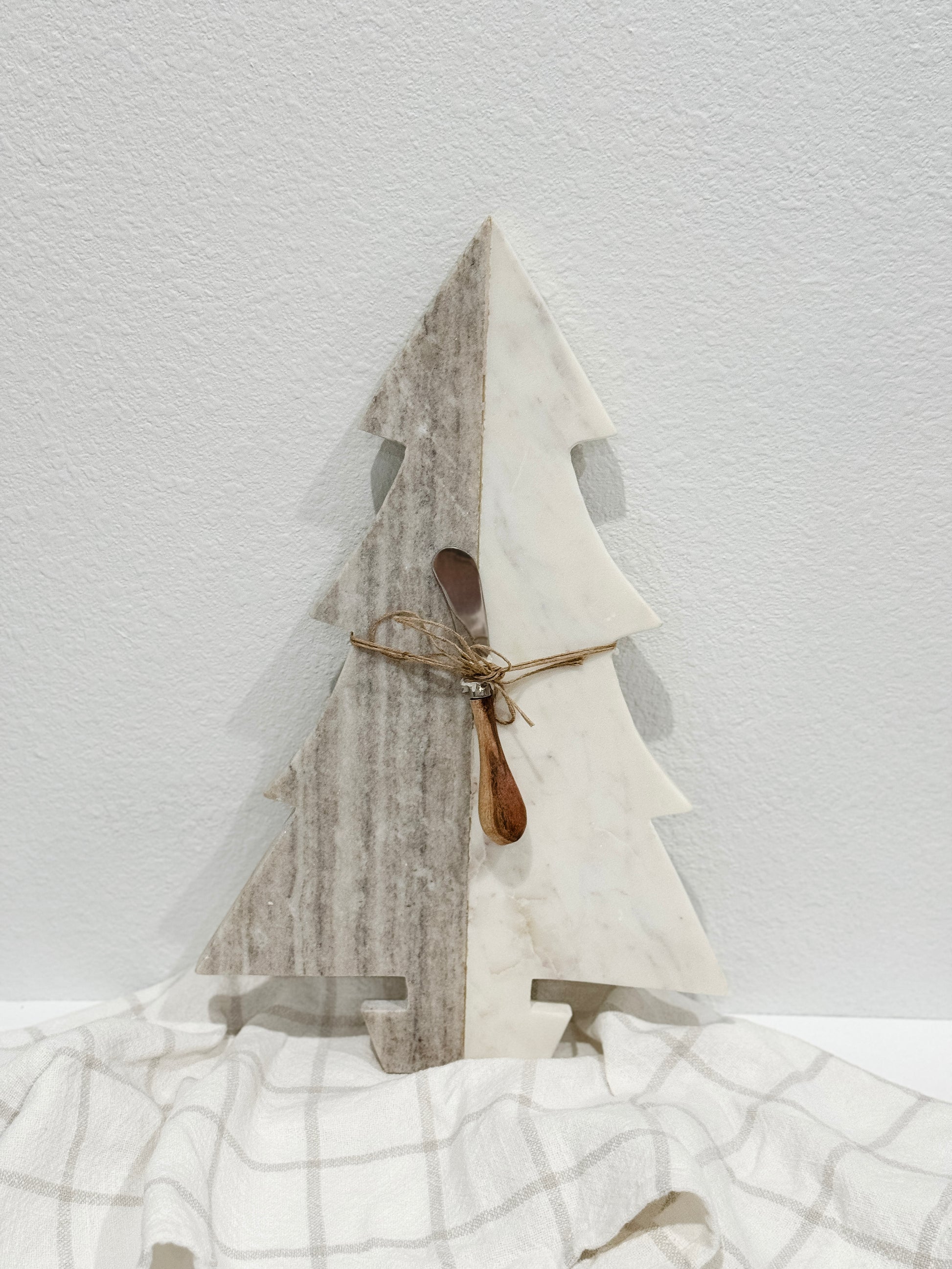 Handcrafted marble Christmas tree board for holiday entertaining