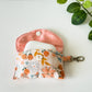 Peach Blossom Meadow Mini Snap Pouch – Handmade Floral Airpod  Case with pink polkadot interior fabric
