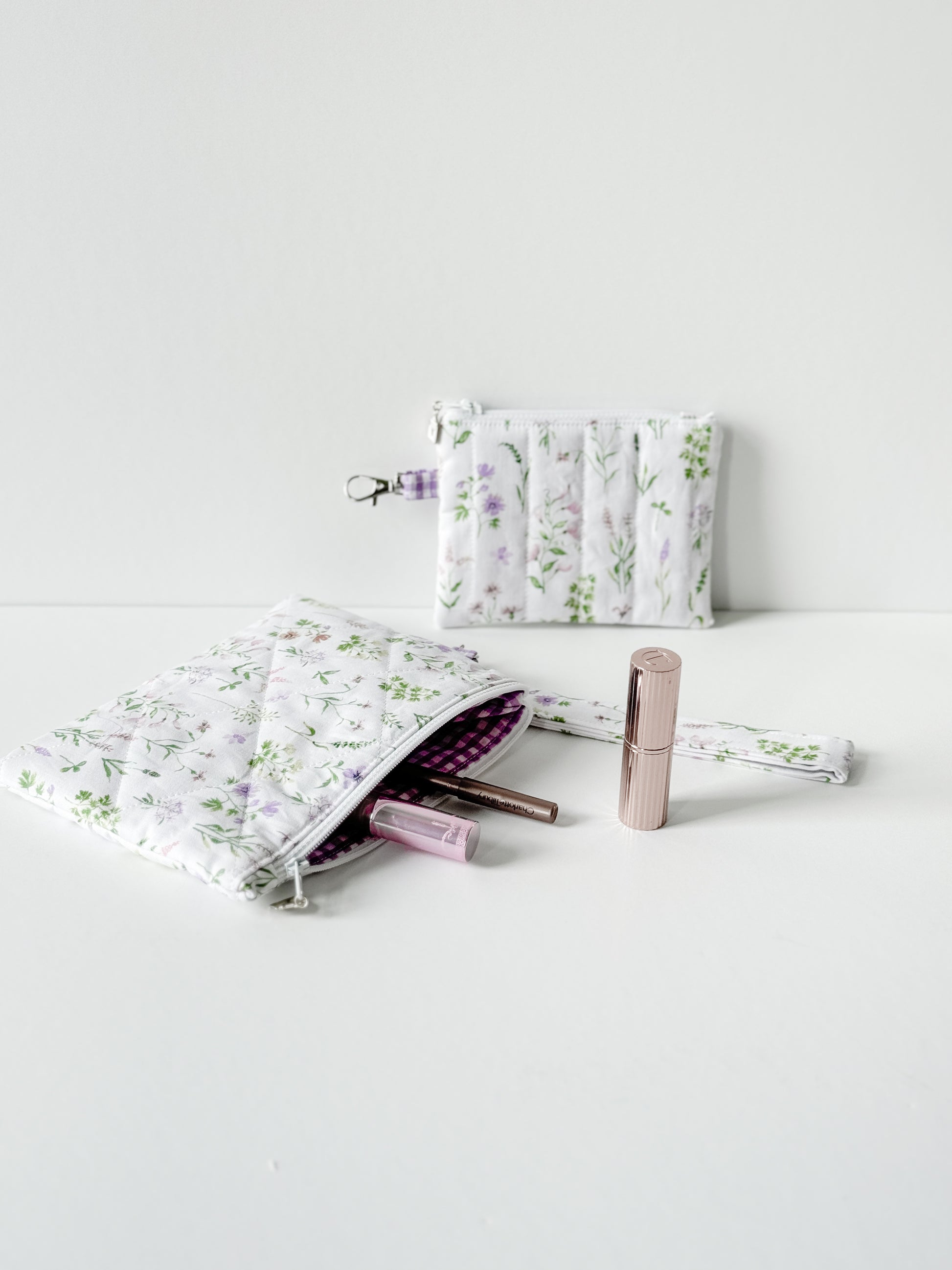 Handmade Lavender Meadow Coin Purse and wristlet featuring a lavender floral quilted cotton pattern