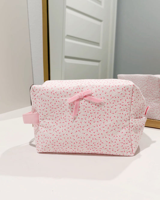 Handmade quilted toiletry pouch with rosebud print by ss home collective