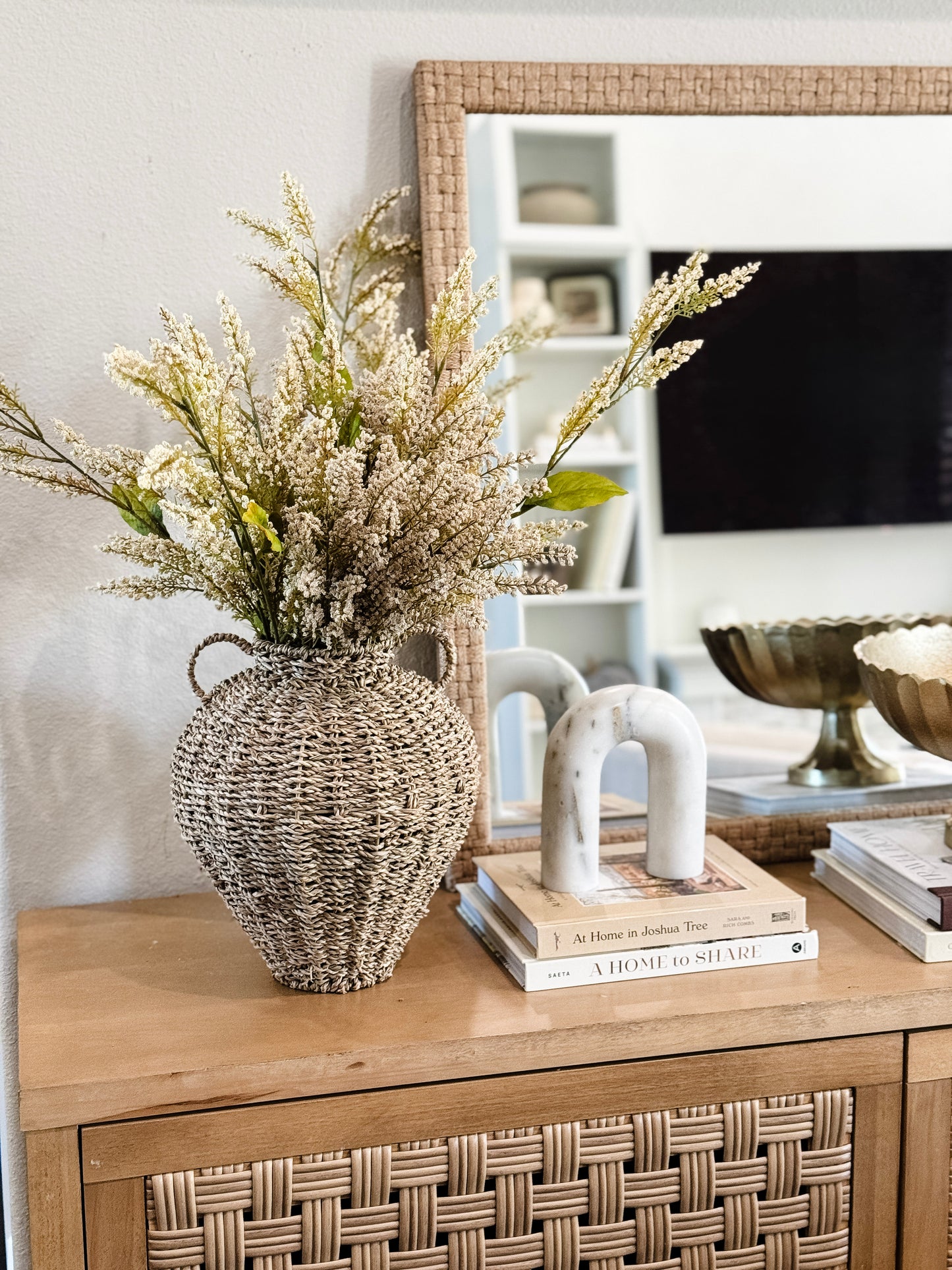 Seagrass vase styled for neutral home décor