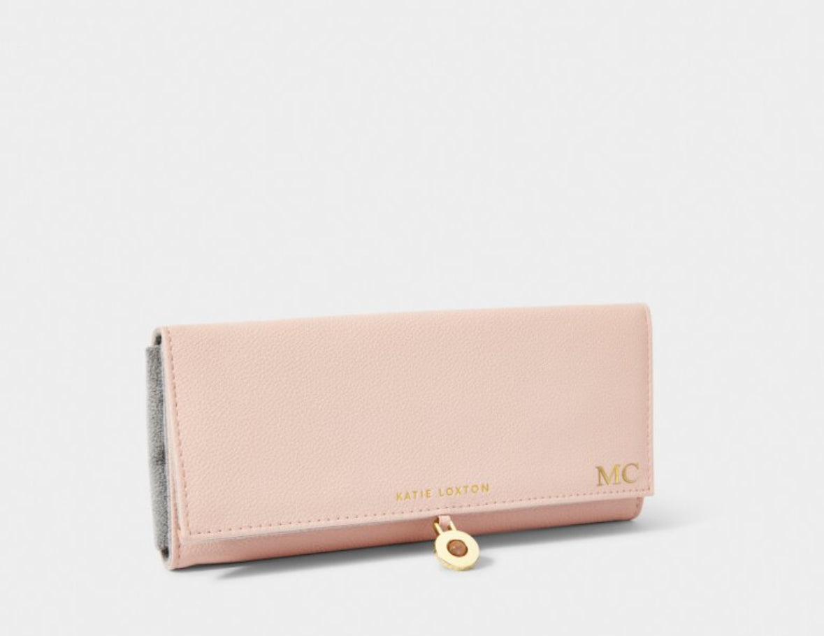 Stylish Jewelry Pouch in Dusty Pink, perfect for organizing you jewelry while traveling.