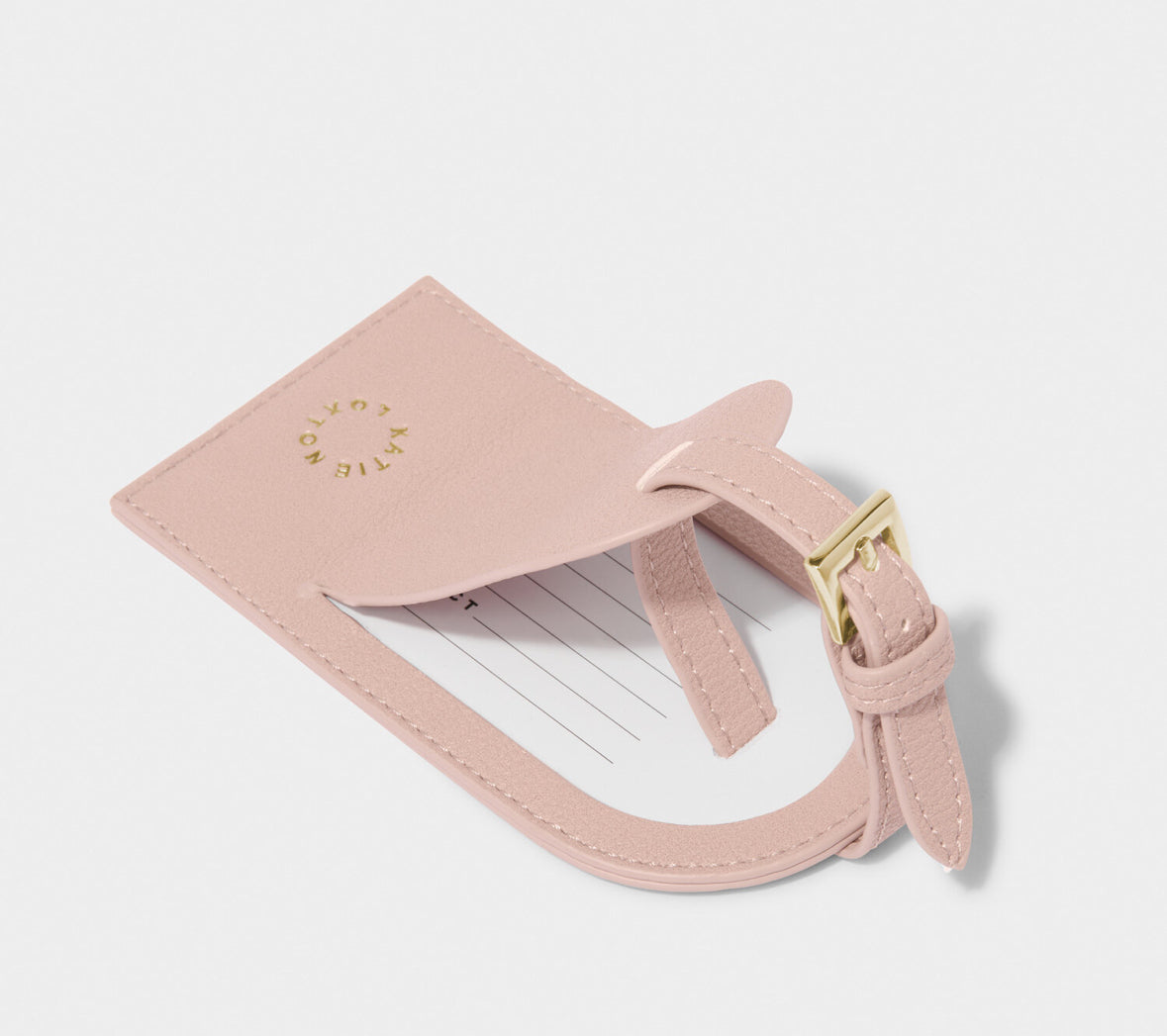 Back view of the Katie Loxton Choose Adventure luggage tag in Dusty Pink showing the concealed personal information card.