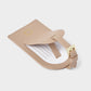 Back view of the Katie Loxton Forever Exploring luggage tag in Soft Tan showing the concealed personal information card.