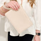 Katie Loxton Zana wristlet pouch made of soft vegan leather in the color eggshell