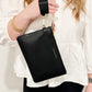 Katie Loxton Zana wristlet pouch made of vegan leather in the color black