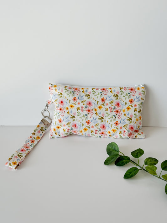 Sew Hailey Said floral handmade quilted wristlet pouch with floral handle from the petal and posies wildflower and bow collection