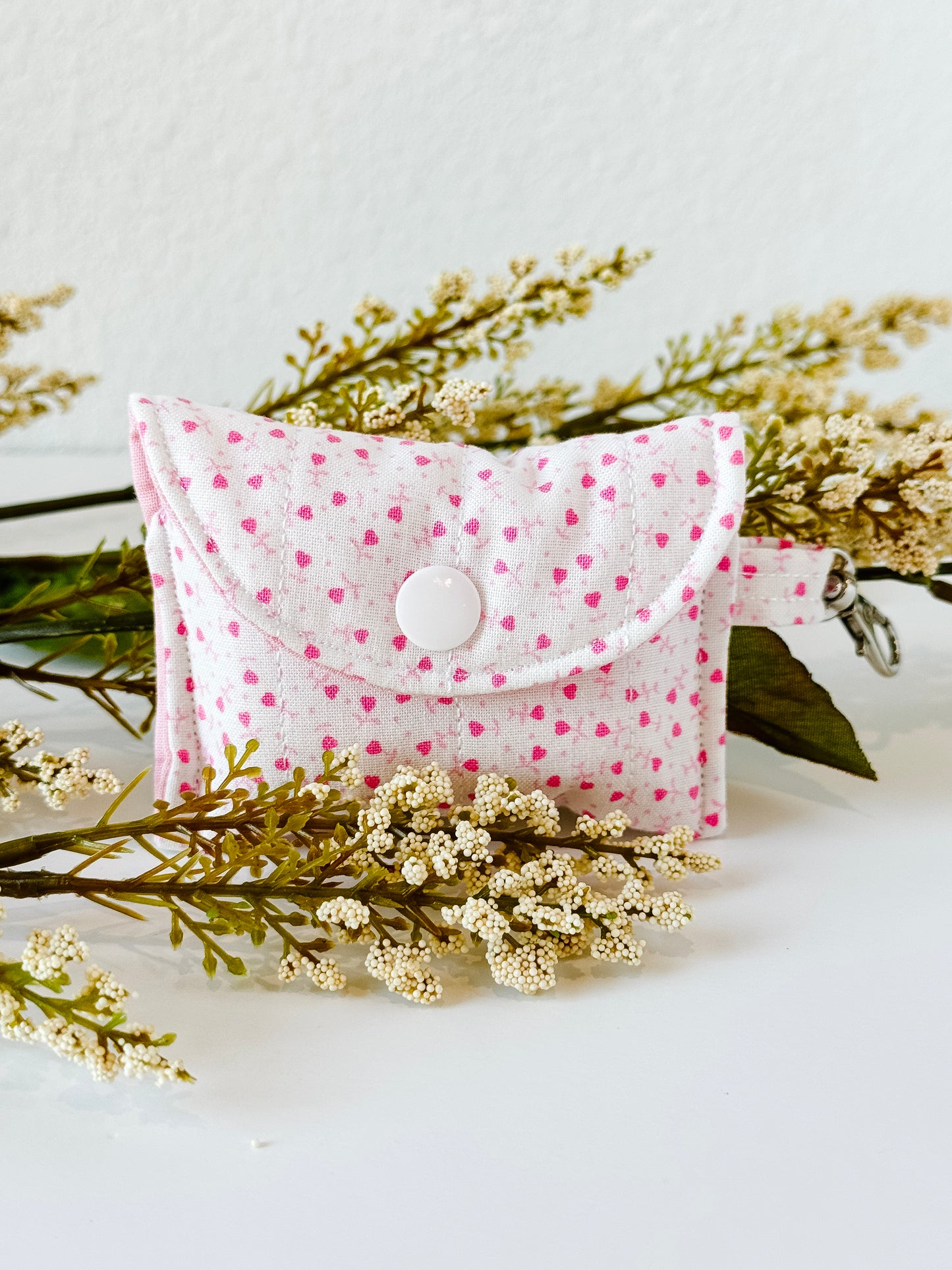 Handmade rosebud quilted AirPods case with snap closure