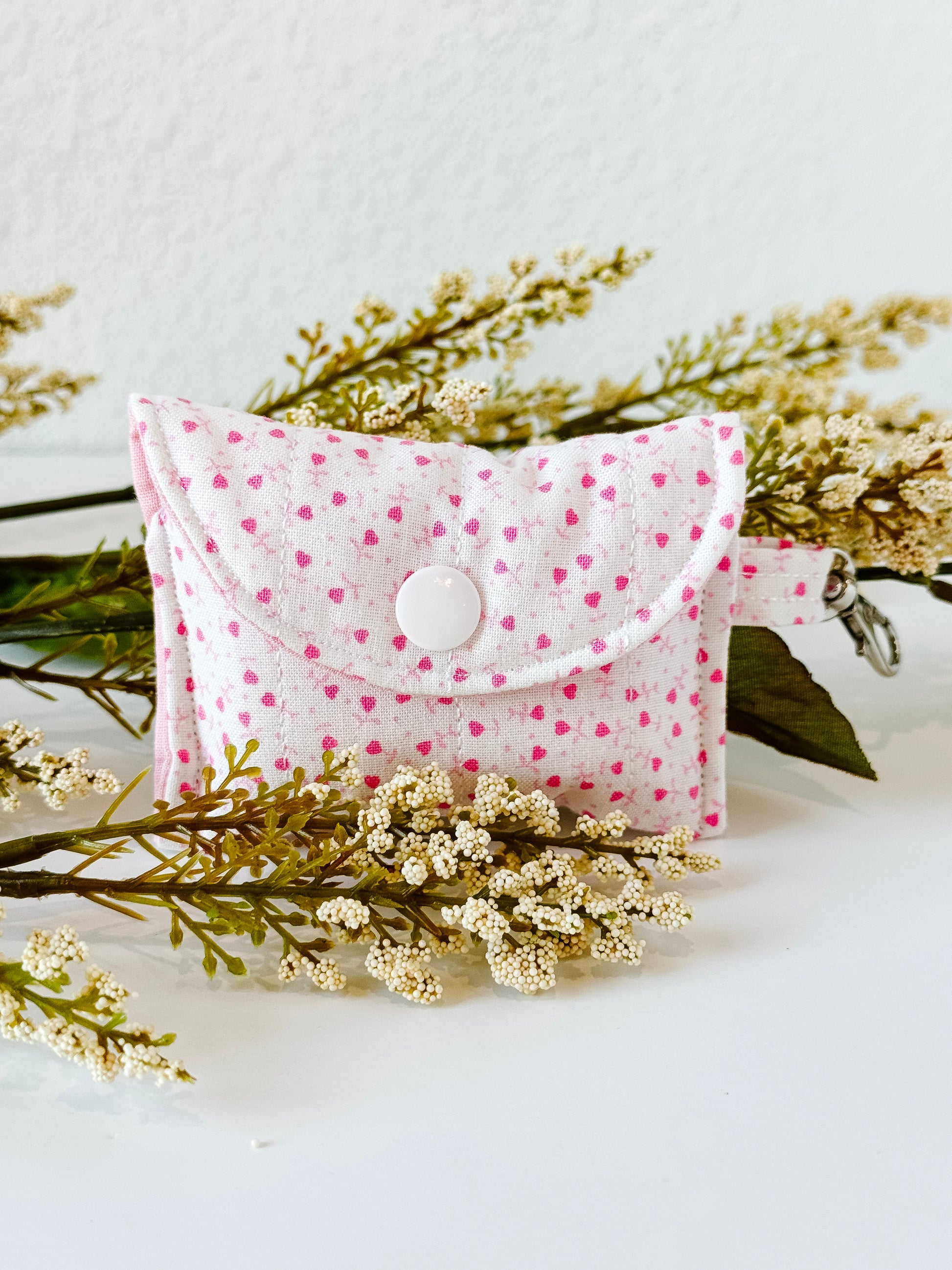 Handmade rosebud quilted AirPods case with snap closure