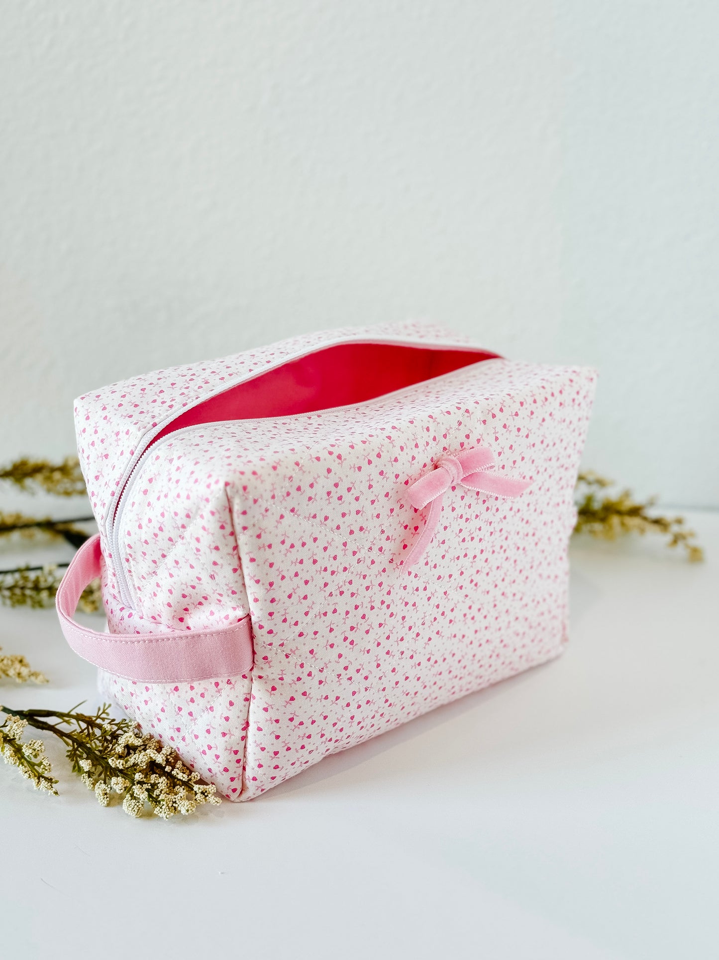 Handmade rosebud quilted boxy makeup bag with pink interior