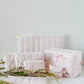 Handmade rosebud quilted cosmetic and pouch collection with pink interiors