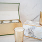Illume candle gift set featuring evergreen, citrus, and white peppercorn notes