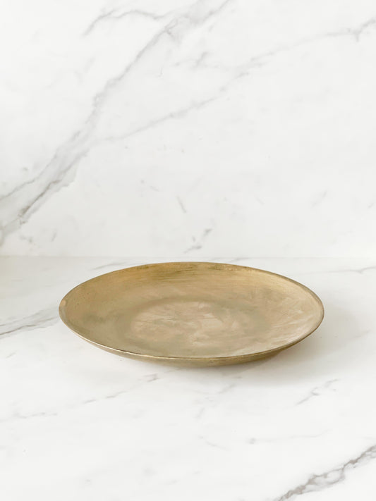 Close-up of metallic gold finish on Creative Co-Op décor plate