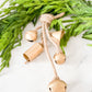 Decorative metal bells with jute hanger for holiday décor
