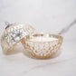 Illume Winter White Mercury Ornament Candle in gold mercury glass vessel