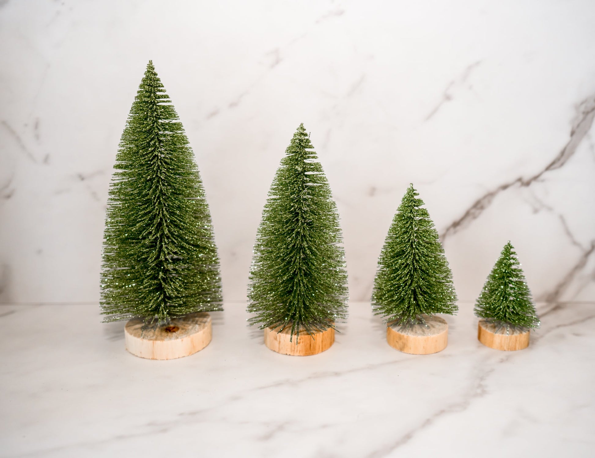 Set of 4 green sisal bottle brush Christmas trees with glitter, heights 3″–8½